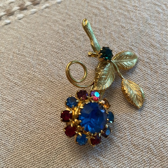 Rhinestone multicolor Flower Pin in Gold-tone setting unused condition - Picture 6 of 11